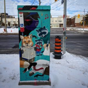 Traffic signal box with a fox, goose, red-winged blackbird, and two raccoons. The animals are anthropomorphized and waiting at a bus stop. There are music notes around the animals and the design background is blue.